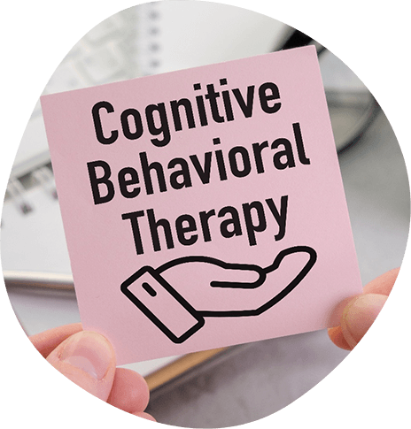 Pink sticky note that says, “cognitive behavioral therapy”