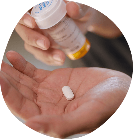 Person preparing to take medication