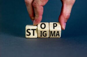 Wooden blocks that say “stop stigma”