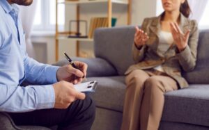Patient and provider talking during psychiatric evaluation